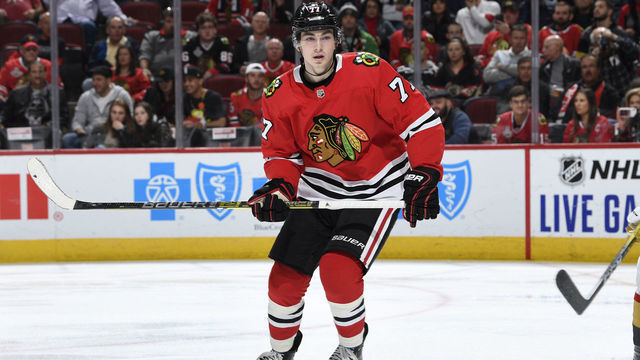CHICAGO, IL - OCTOBER 22: Kirby Dach #77 of the Chicago Blackhawks watches for the puck in the third period against the Vegas Golden Knights at the United Center on October 22, 2019 in Chicago, Illinois. The Vegas Golden Knights defeated the Chicago Blackhawks 2-1.