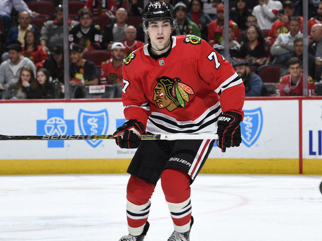 CHICAGO, IL - OCTOBER 22: Kirby Dach #77 of the Chicago Blackhawks watches for the puck in the third period against the Vegas Golden Knights at the United Center on October 22, 2019 in Chicago, Illinois. The Vegas Golden Knights defeated the Chicago Blackhawks 2-1.