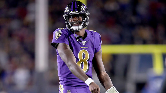 LOS ANGELES, CALIFORNIA - NOVEMBER 25: Quarterback Lamar Jackson #8 of the Baltimore Ravens celebrates his second pass for a touchdown to wide receiver Marquise Brown #15 in the first quarter of the game against the Los Angeles Rams at Los Angeles Memorial Coliseum on November 25, 2019 in Los Angeles, California.