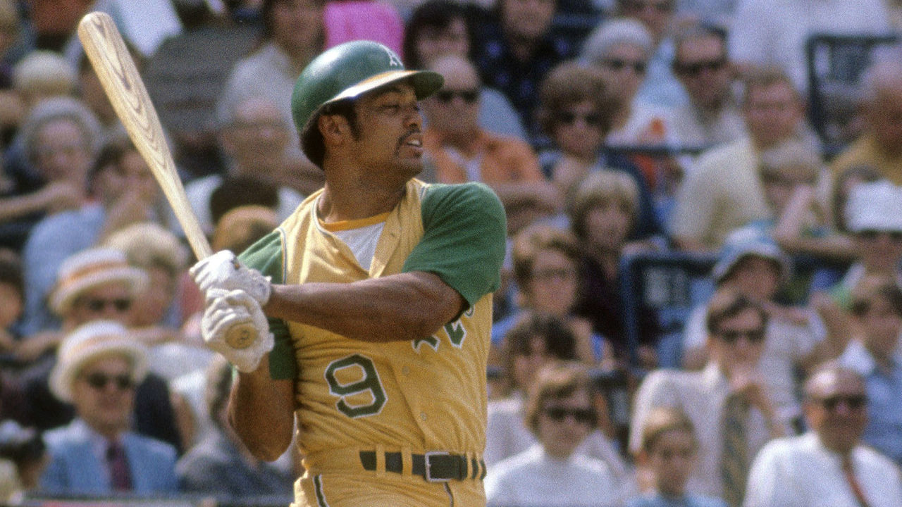 BALTIMORE, MD - CIRCA 1970: Outfielder Reggie Jackson #9 of the Oakland Athletics swings and misses the pitch against the Baltimore Orioles during a Major League Baseball game circa 1970 at Memorial Stadium in Baltimore, Maryland. Jackson played for the Athletics from 1967-75 and 1985.