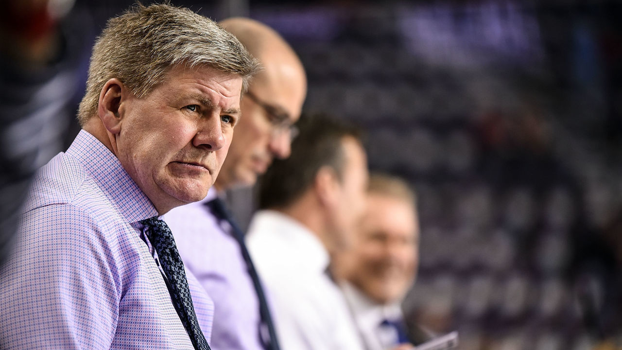 CALGARY, AB - MARCH 15: Head coach for the Calgary Flames Bill Peters watches warm ups before an NHL game where the Calgary Flames hosted the New York Rangers on March 15, 2019, at the Scotiabank Saddledome in Calgary, AB.