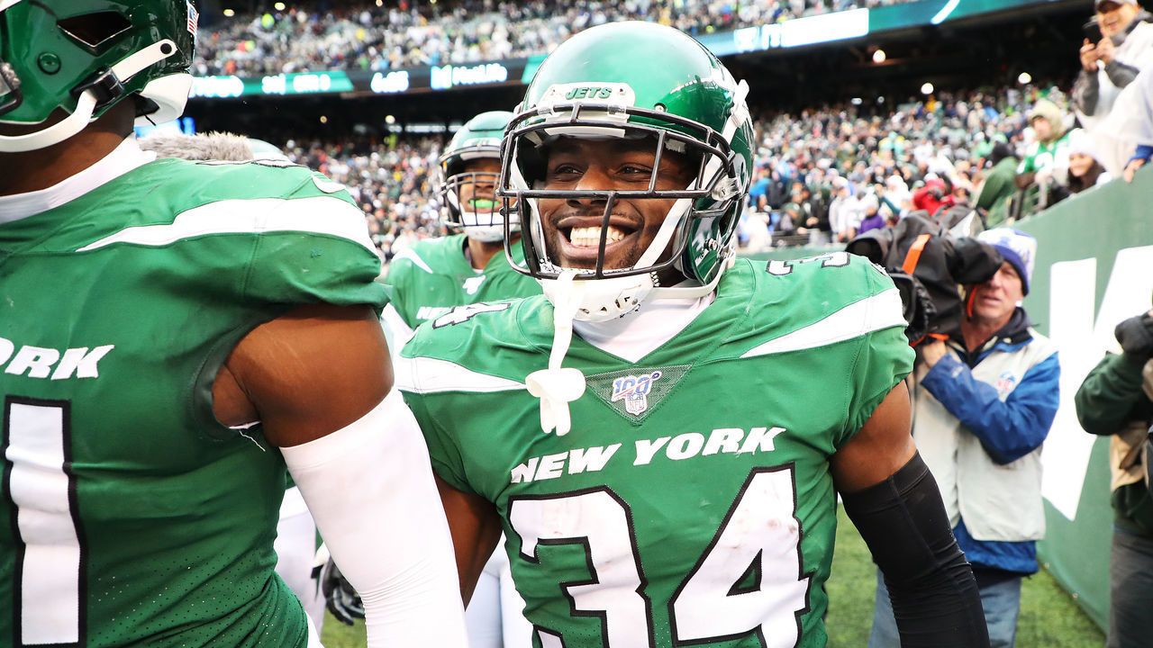 EAST RUTHERFORD, NEW JERSEY - NOVEMBER 24: Brian Poole #34 of the New York Jets celebrates his third quarter interception return for a touchdown against the Oakland Raiders during their game at MetLife Stadium on November 24, 2019 in East Rutherford, New Jersey.