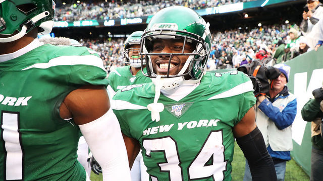 EAST RUTHERFORD, NEW JERSEY - NOVEMBER 24: Brian Poole #34 of the New York Jets celebrates his third quarter interception return for a touchdown against the Oakland Raiders during their game at MetLife Stadium on November 24, 2019 in East Rutherford, New Jersey.