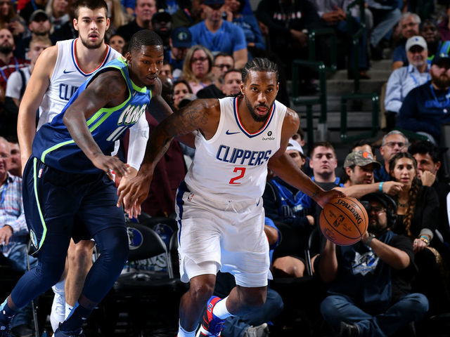 Paul George of the LA Clippers handles the ball against the Dallas