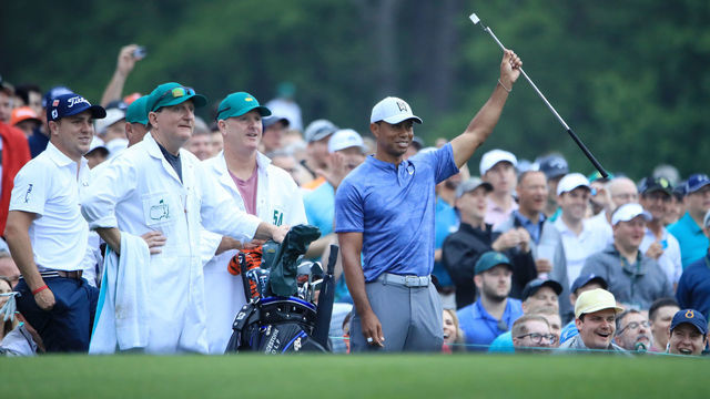 AUGUSTA, GEORGIA - APRIL 08: Tiger Woods of the United States reacts to his shot on the 12th tee as caddie Joe LaCava and Justin Thomas of the United States look on during a practice round prior to The Masters at Augusta National Golf Club on April 08, 2019 in Augusta, Georgia.