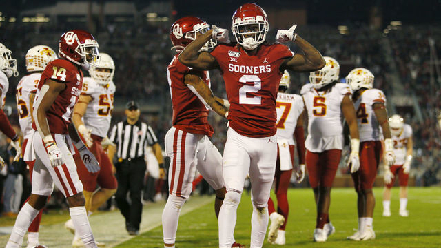 NORMAN, OK - NOVEMBER 9: Wide receiver CeeDee Lamb #2 of the Oklahoma Sooners celebrates his touchdown on a 63-yard catch and run against the Iowa State Cyclones in the second quarter on November 9, 2019 at Gaylord Family Oklahoma Memorial Stadium in Norman, Oklahoma. OU leads 35-14 at the half.