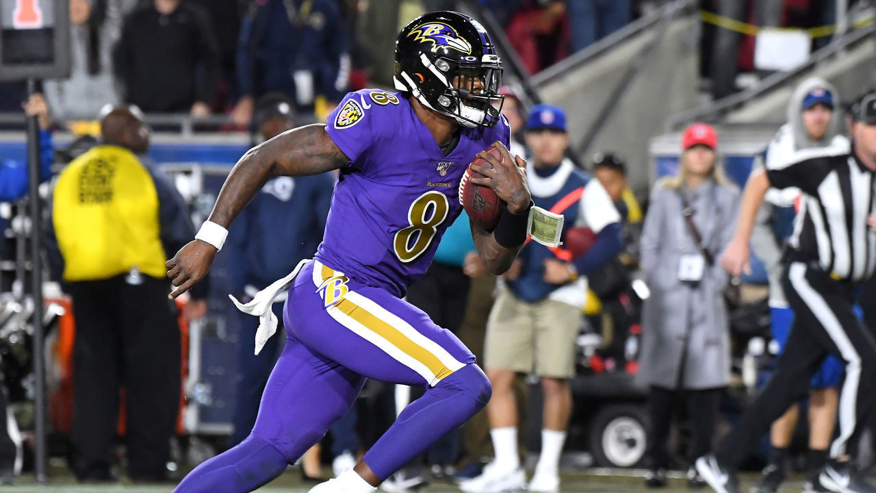 LOS ANGELES, CA - NOVEMBER 25: Quarterback Lamar Jackson #8 of the Baltimore Ravens runs the ball in the second half of the game against the Los Angeles Rams at the Los Angeles Memorial Coliseum on November 25, 2019 in Los Angeles, California.