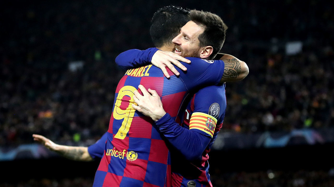 BARCELONA, SPAIN - NOVEMBER 27: Luis Suarez of FC Barcelona celebrates with teammate Lionel Messi after scoring his team's first goal during the UEFA Champions League group F match between FC Barcelona and Borussia Dortmund at Camp Nou on November 27, 2019 in Barcelona, Spain.