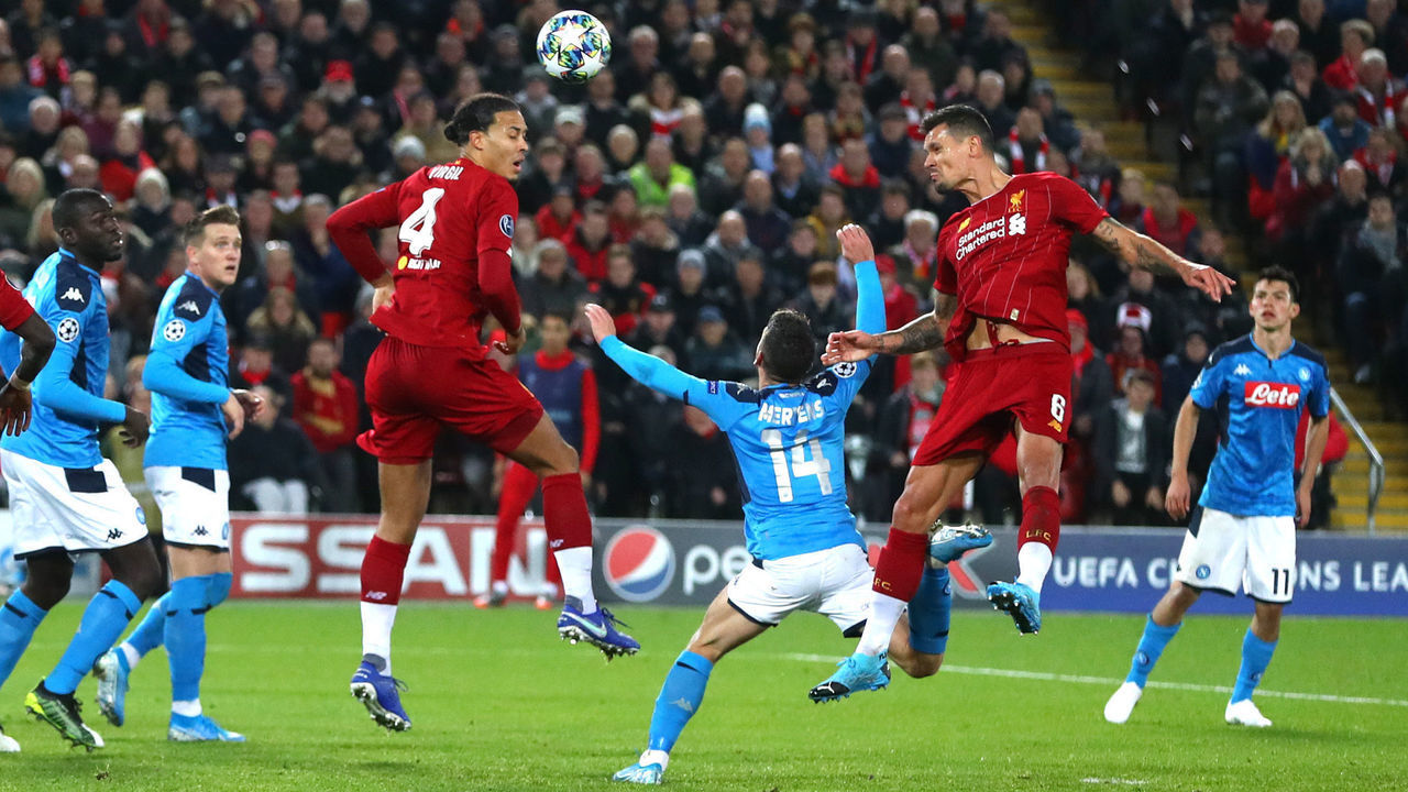 LIVERPOOL, ENGLAND - NOVEMBER 27: Dejan Lovren of Liverpool scores his teams first goal during the UEFA Champions League group E match between Liverpool FC and SSC Napoli at Anfield on November 27, 2019 in Liverpool, United Kingdom.