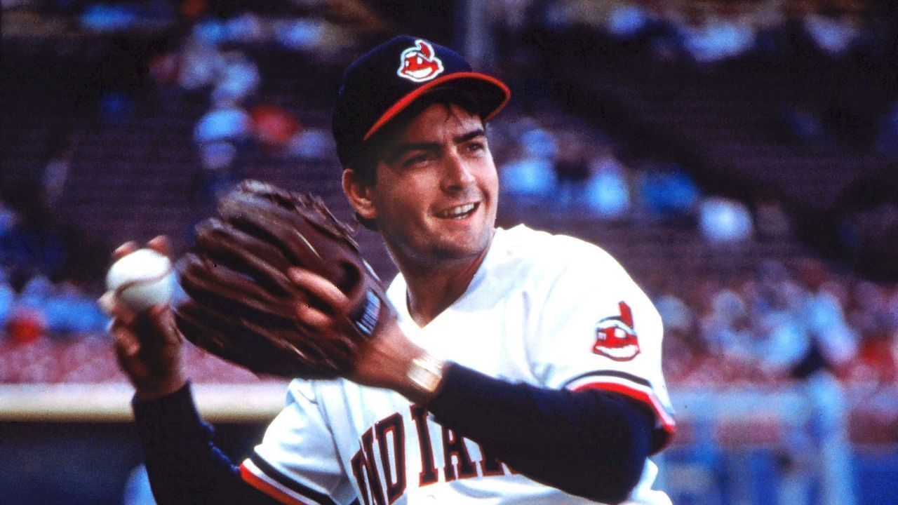 CLEVELAND - JULY 1: Actor Charlie Sheen in town to promote the movie 'Major League' warms up prior to an Indians game at the Cleveland Municipal Stadium on July 1, 1988 in Cleveland, Ohio .