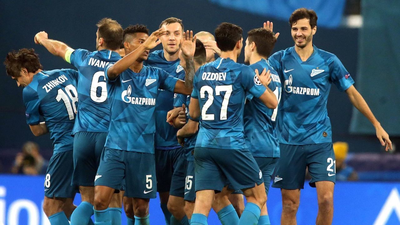 SAINT PETERSBURG, RUSSIA - NOVEMBER 27: Magomed Ozdoev (#27) of Saint Petersburg celebrates with team mates after scoring his team's 2nd goal during the UEFA Champions League group G match between Zenit St. Petersburg and Olympique Lyon at Gazprom Arena on November 27, 2019 in Saint Petersburg, Russia.
