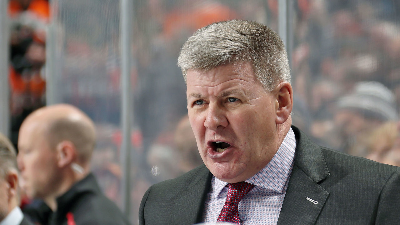 PHILADELPHIA, PA - NOVEMBER 23: Head Coach of the Calgary Flames Bill Peters reacts to a play on the ice against the Philadelphia Flyers on November 23, 2019 at the Wells Fargo Center in Philadelphia, Pennsylvania.