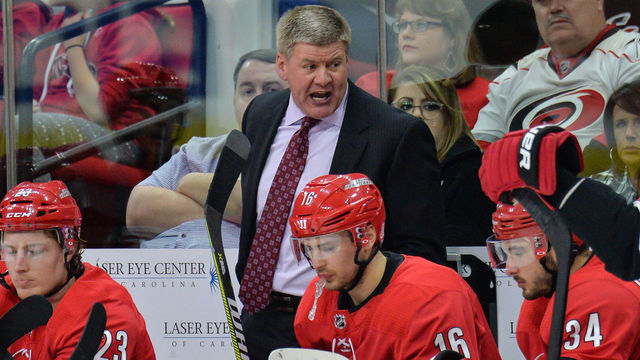 RALEIGH, NC - JANUARY 21: Carolina Hurricanes head coach Bill Peters gets animated on the bench in a timeout during a game between the Vegas Golden Knights and the Carolina Hurricanes at the PNC Arena in Raleigh, NC on January 21, 2018. Vegas defeated Carolina 5-1.