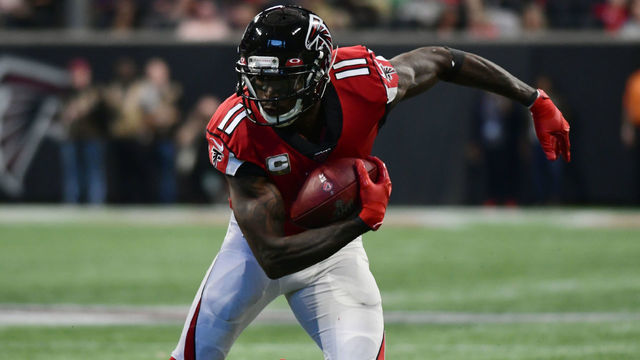 ATLANTA, GA - NOVEMBER 24: Atlanta Falcons Wide Receiver Julio Jones (11) rushes the ball during the NFL game between the Tampa Bay Buccaneers and the Atlanta Falcons on November 24, 2019, at Mercedes-Benz Stadium in Atlanta, GA.