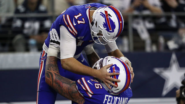 ARLINGTON, TEXAS - NOVEMBER 28: Josh Allen #17 of the Buffalo Bills celebrates a touchdown with Jon Feliciano #76 against the Dallas Cowboys in the second half at AT&T Stadium on November 28, 2019 in Arlington, Texas.