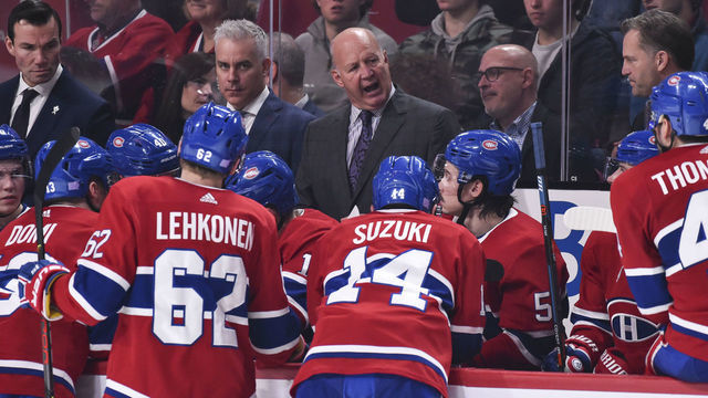 MONTREAL, QC - NOVEMBER 26: Head coach of the Montreal Canadiens Claude Julien talks to players during a time-out against the Boston Bruins during the second period at the Bell Centre on November 26, 2019 in Montreal, Canada.