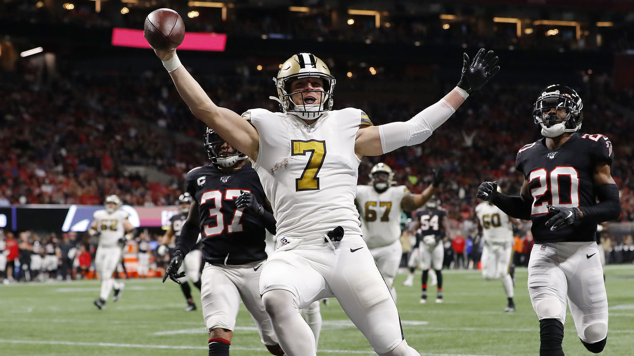 ATLANTA, GEORGIA - NOVEMBER 28: Taysom Hill #7 of the New Orleans Saints celebrates as he scores on a 30-yard touchdown run during the second quarter against the Atlanta Falcons at Mercedes-Benz Stadium on November 28, 2019 in Atlanta, Georgia.