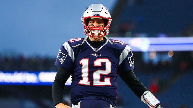 FOXBOROUGH, MA - NOVEMBER 24: Tom Brady #12 of the New England Patriots reacts before a game against the Dallas Cowboys at Gillette Stadium on November 24, 2019 in Foxborough, Massachusetts.