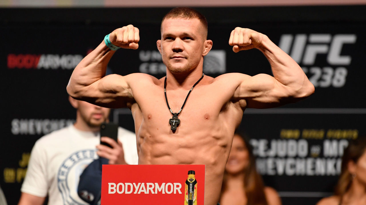CHICAGO, IL - JUNE 07: Petr Yan of Russia poses on the scale during the UFC 238 weigh-in at the United Center on June 7, 2019 in Chicago, Illinois.