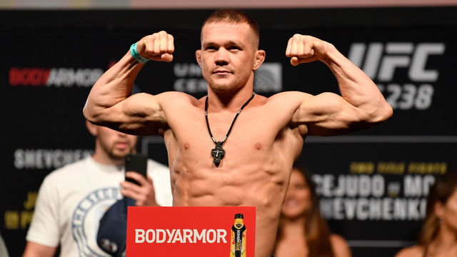 CHICAGO, IL - JUNE 07: Petr Yan of Russia poses on the scale during the UFC 238 weigh-in at the United Center on June 7, 2019 in Chicago, Illinois.