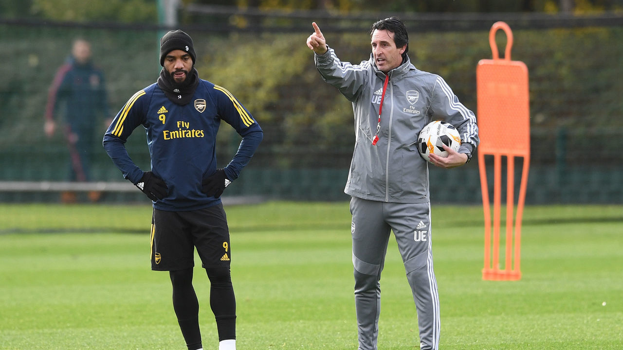 ST ALBANS, ENGLAND - NOVEMBER 27: Unai Emery the Arsenal Head Coach with Alexandre Lacazette of Arsenal during Arsenal Training Session at London Colney on November 27, 2019 in St Albans, England.