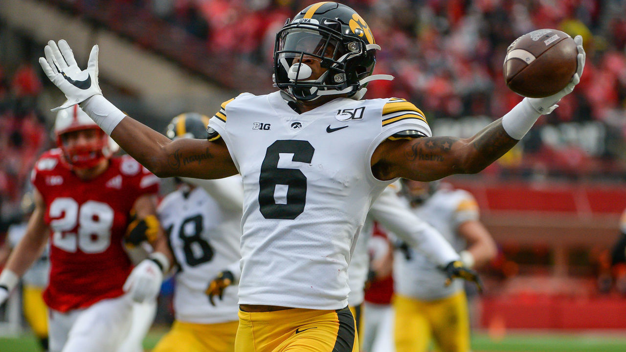 LINCOLN, NE - NOVEMBER 29: Wide receiver Ihmir Smith-Marsette #6 of the Iowa Hawkeyes scores on a kickoff return against the Nebraska Cornhuskers at Memorial Stadium on November 29, 2019 in Lincoln, Nebraska.