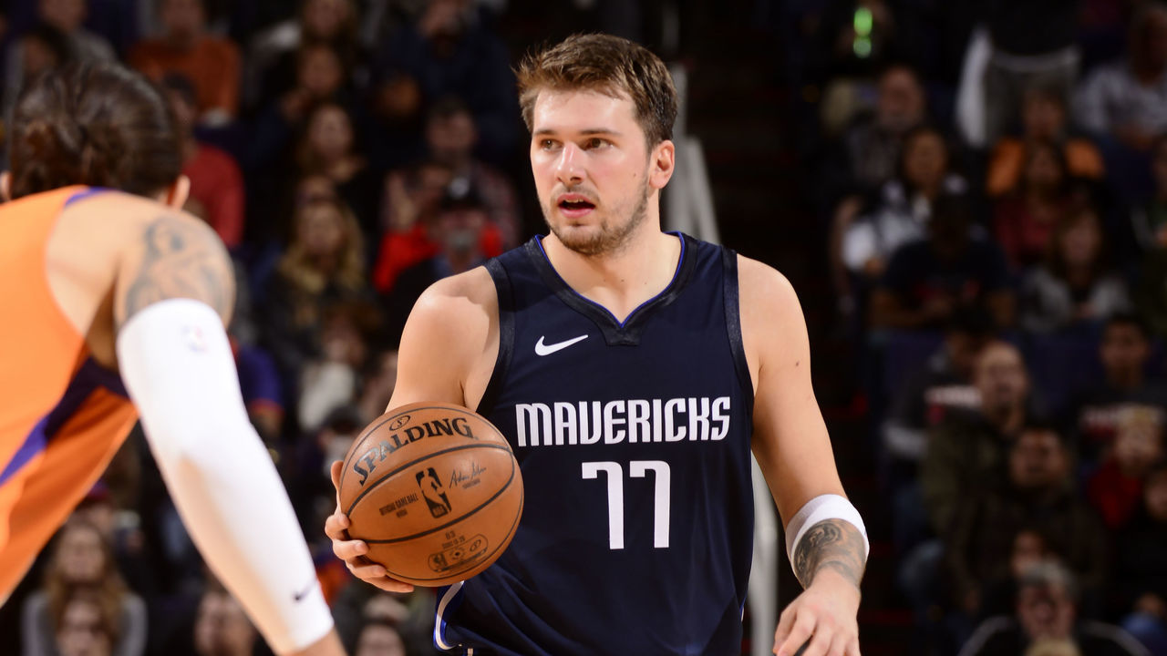 PHOENIX, AZ - NOVEMBER 29: Luka Doncic #77 of the Dallas Mavericks handles the ball against the Phoenix Suns on November 29, 2019 at Talking Stick Resort Arena in Phoenix, Arizona. Mandatory Copyright Notice: Copyright 2019 NBAE