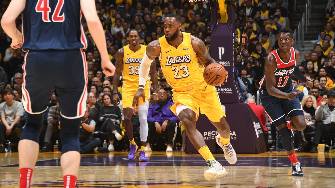 LOS ANGELES, CA - NOVEMBER 29: LeBron James #23 of the Los Angeles Lakers handles the ball against the Washington Wizards on November 29, 2019 at STAPLES Center in Los Angeles, California. NOTE TO USER: User expressly acknowledges and agrees that, by downloading and/or using this Photograph, user is consenting to the terms and conditions of the Getty Images License Agreement. Mandatory Copyright Notice: Copyright 2019 NBAE