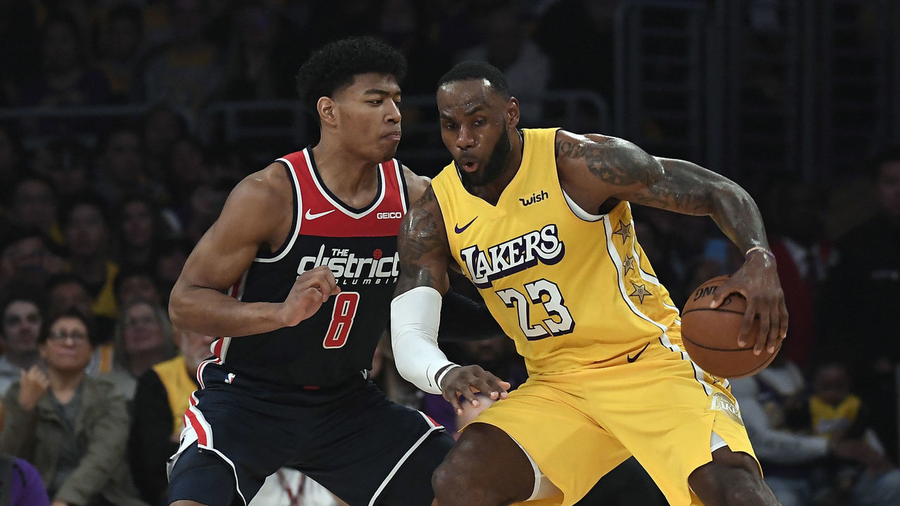 LOS ANGELES, CA - NOVEMBER 29: Rui Hachimura #8 of the Washington Wizards defends against LeBron James #23 of the Los Angeles Lakers during the second half at Staples Center on November 29, 2019 in Los Angeles, California.