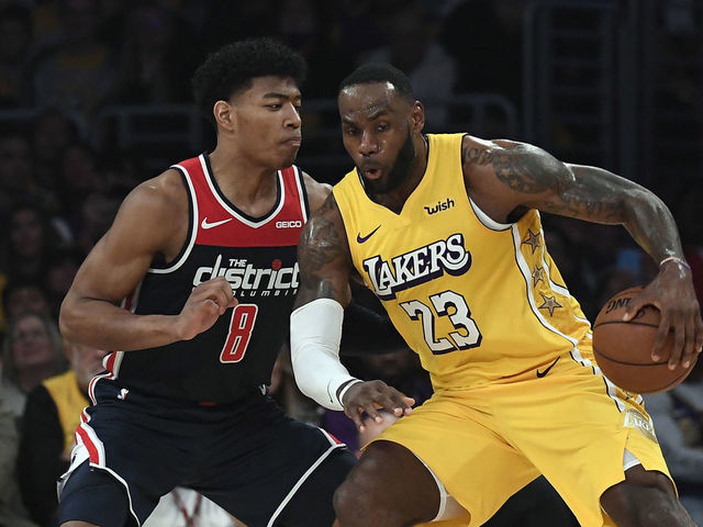 LOS ANGELES, CA - NOVEMBER 29: Rui Hachimura #8 of the Washington Wizards defends against LeBron James #23 of the Los Angeles Lakers during the second half at Staples Center on November 29, 2019 in Los Angeles, California.