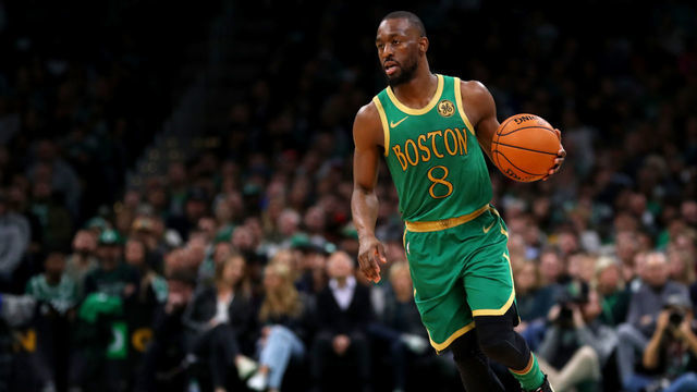 BOSTON, MASSACHUSETTS - NOVEMBER 27: Kemba Walker #8 of the Boston Celtics dribbles during the first half of the game against the Brooklyn Nets at TD Garden on November 27, 2019 in Boston, Massachusetts.