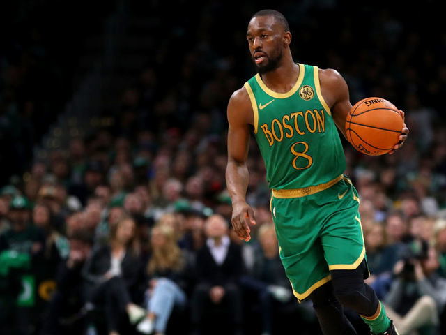 BOSTON, MASSACHUSETTS - NOVEMBER 27: Kemba Walker #8 of the Boston Celtics dribbles during the first half of the game against the Brooklyn Nets at TD Garden on November 27, 2019 in Boston, Massachusetts.