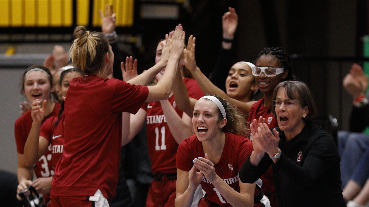 VICTORIA , BC - NOVEMBER 30: Lexie Hull #12 of the Stanford Cardinal celebrates with the Head Coach Tara VanDerveer during a game against the Mississippi State Bulldogs at the Greater Victoria Invitational at the Centre for Athletics, Recreation and Special Abilities (CARSA) on November 30, 2019 in Victoria, British Columbia, Canada.