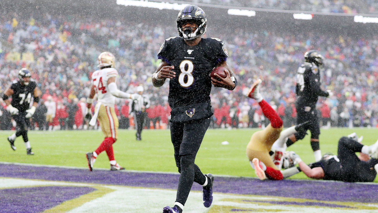 BALTIMORE, MARYLAND - DECEMBER 01: Lamar Jackson #8 of the Baltimore Ravens rushes for a 1-yard touchdown during the second quarter against the San Francisco 49ers at M&T Bank Stadium on December 01, 2019 in Baltimore, Maryland.