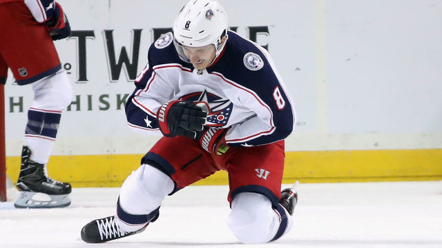 NEW YORK, NEW YORK - NOVEMBER 30: Zach Werenski #8 of the Columbus Blue Jackets is injured during the first period against the New York Islanders at the Barclays Center on November 30, 2019 in the Brooklyn borough of New York City. The Islanders shut-out the Blue Jackets 2-0.