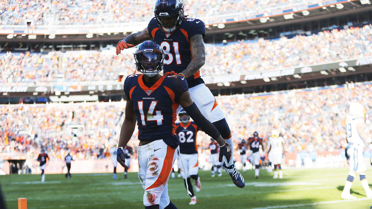 DENVER, CO - DECEMBER 01: Denver Broncos wide receiver Tim Patrick (81) celebrates a touchdown catch by Denver Broncos wide receiver Courtland Sutton (14) during a regular season game between the Denver Broncos and the visiting Los Angeles Chargers on December 1, 2019 at Empower Field at Mile High in Denver, CO.