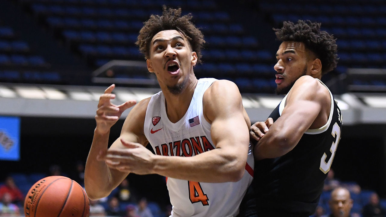 ANAHEIM, CA - DECEMBER 01: Olivier Sarr #30 of the Wake Forest Demon Deacons guards Chase Jeter #4 of the Arizona Wildcats in the first half of the game during the Wooden Legacy at the Anaheim Convention Center at on December 1, 2019 in Anaheim, California.