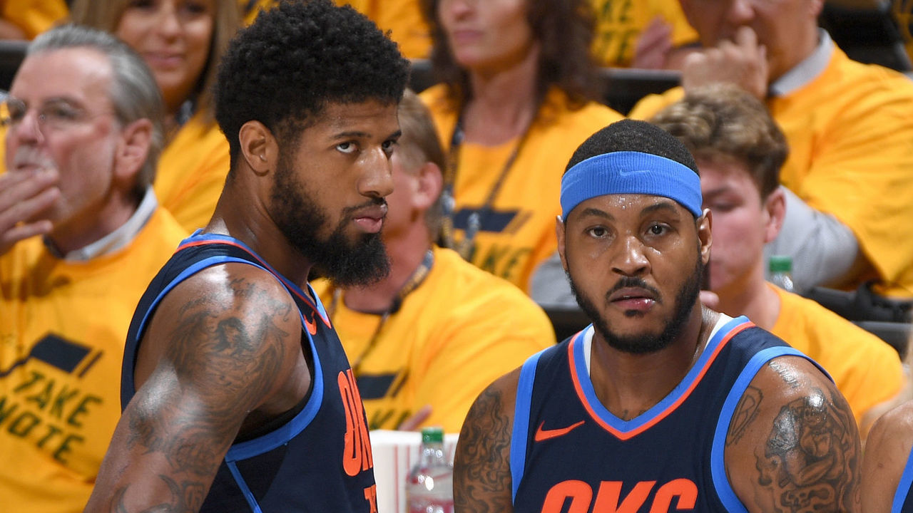 SALT LAKE CITY, UT - APRIL 27: Paul George #13, Carmelo Anthony #7, and Russell Westbrook #0 of the Oklahoma City Thunder in Game Six of the Western Conference Quarterfinals against the Utah Jazz during the 2018 NBA Playoffs on April 27, 2018 at Vivint Smart Home Arena in Salt Lake City, Utah. NOTE TO USER: User expressly acknowledges and agrees that, by downloading and/or using this photograph, user is consenting to the terms and conditions of the Getty Images License Agreement. Mandatory Copyright Notice: Copyright 2018 NBAE