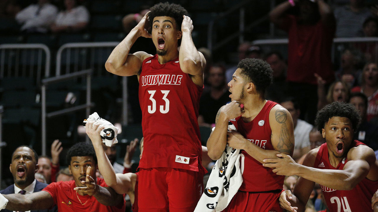 MIAMI, FLORIDA - NOVEMBER 05: Jordan Nwora #33 of the Louisville Cardinals reacts on the bench against the Miami Hurricanes during the second half at Watsco Center on November 05, 2019 in Miami, Florida.