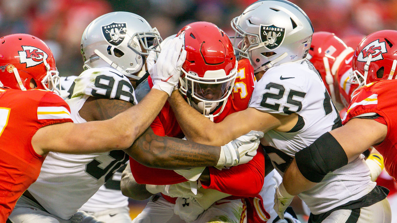 KANSAS CITY, MO - DECEMBER 01: Kansas City Chiefs running back Darrel Williams (31) is hit during the AFC West Division game against the Oakland Raiders on December 1, 2019 at Arrowhead Stadium in Kansas City, Missouri.