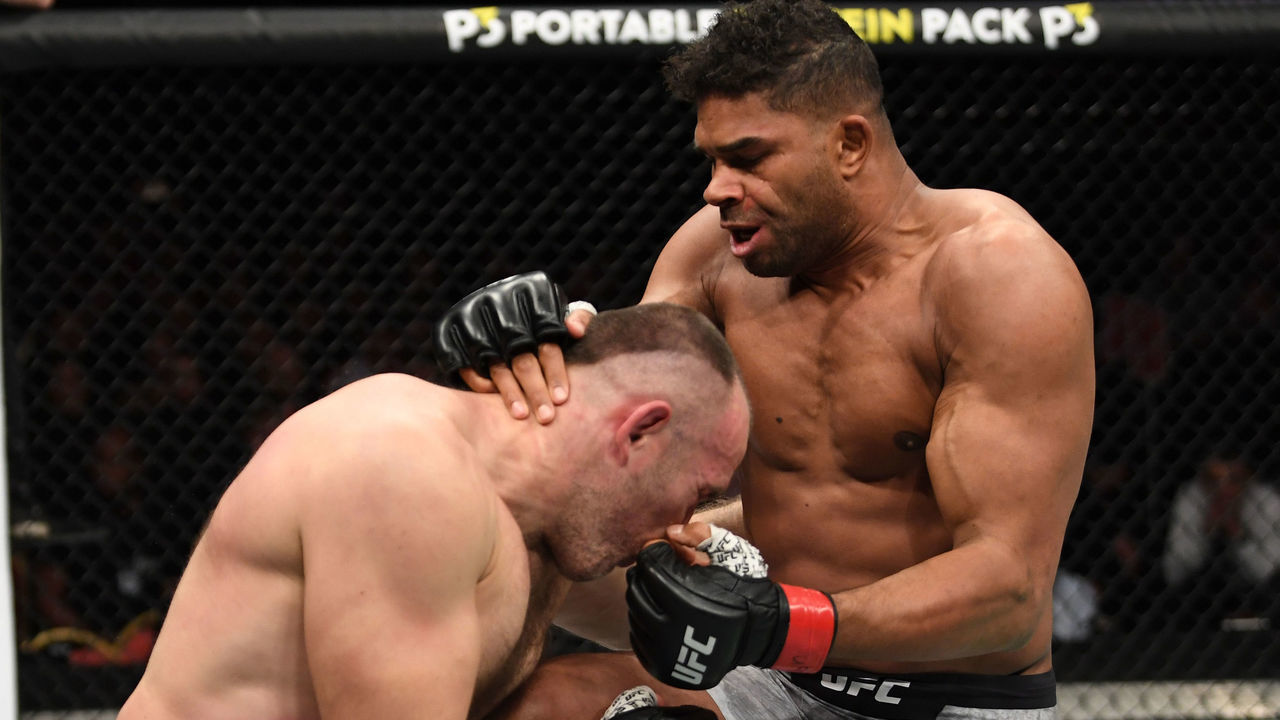 SAINT PETERSBURG, RUSSIA - APRIL 20: (R-L) Alistair Overeem of The Netherlands knees Aleksei Oleinik of Russia in their heavyweight bout during the UFC Fight Night event at Yubileyny Sports Palace on April 20, 2019 in Saint Petersburg, Russia.