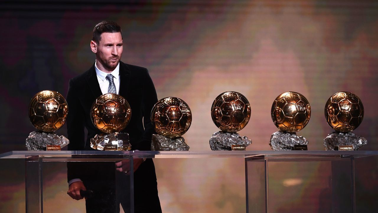 Barcelona's Argentinian forward Lionel Messi reacts after winning the Ballon d'Or France Football 2019 trophy at the Chatelet Theatre in Paris on December 2, 2019. - Lionel Messi won a record-breaking sixth Ballon d'Or on Monday after another sublime year for the Argentinian, whose familiar brilliance remained undimmed even through difficult times for club and country.