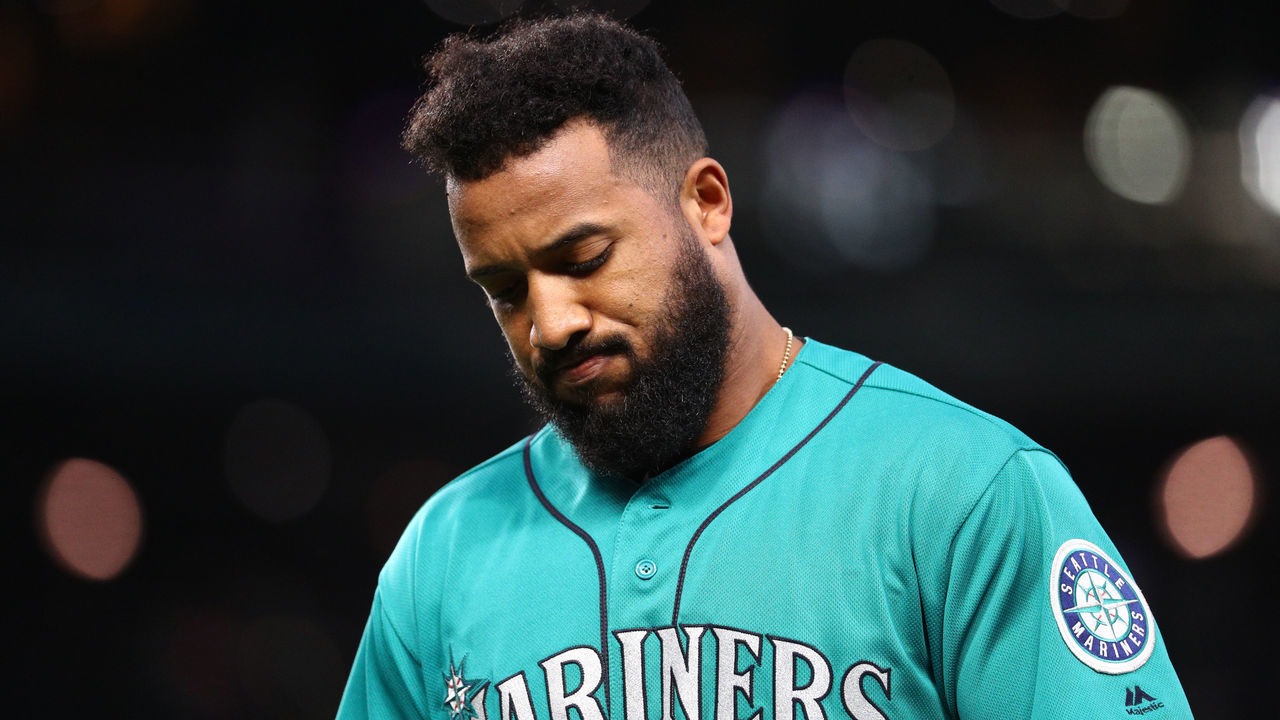 SEATTLE, WASHINGTON - MAY 17:Domingo Santana #16 of the Seattle Mariners reacts after being unable to get on base in the fifth inning against the Minnesota Twins during their game at T-Mobile Park on May 17, 2019 in Seattle, Washington.