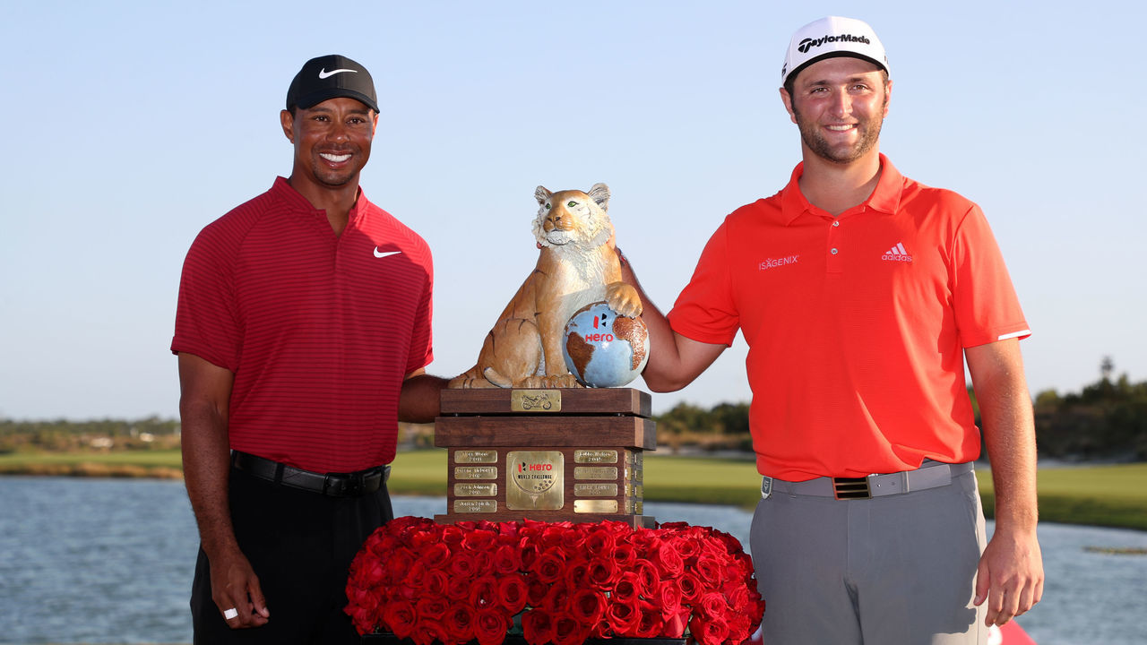 NASSAU, BAHAMAS - DECEMBER 02: Jon Rahm of Spain poses with the trophy and tournament host Tiger Woods of the United States after winning the Hero World Challenge at Albany, Bahamas on December 02, 2018 in Nassau, Bahamas.