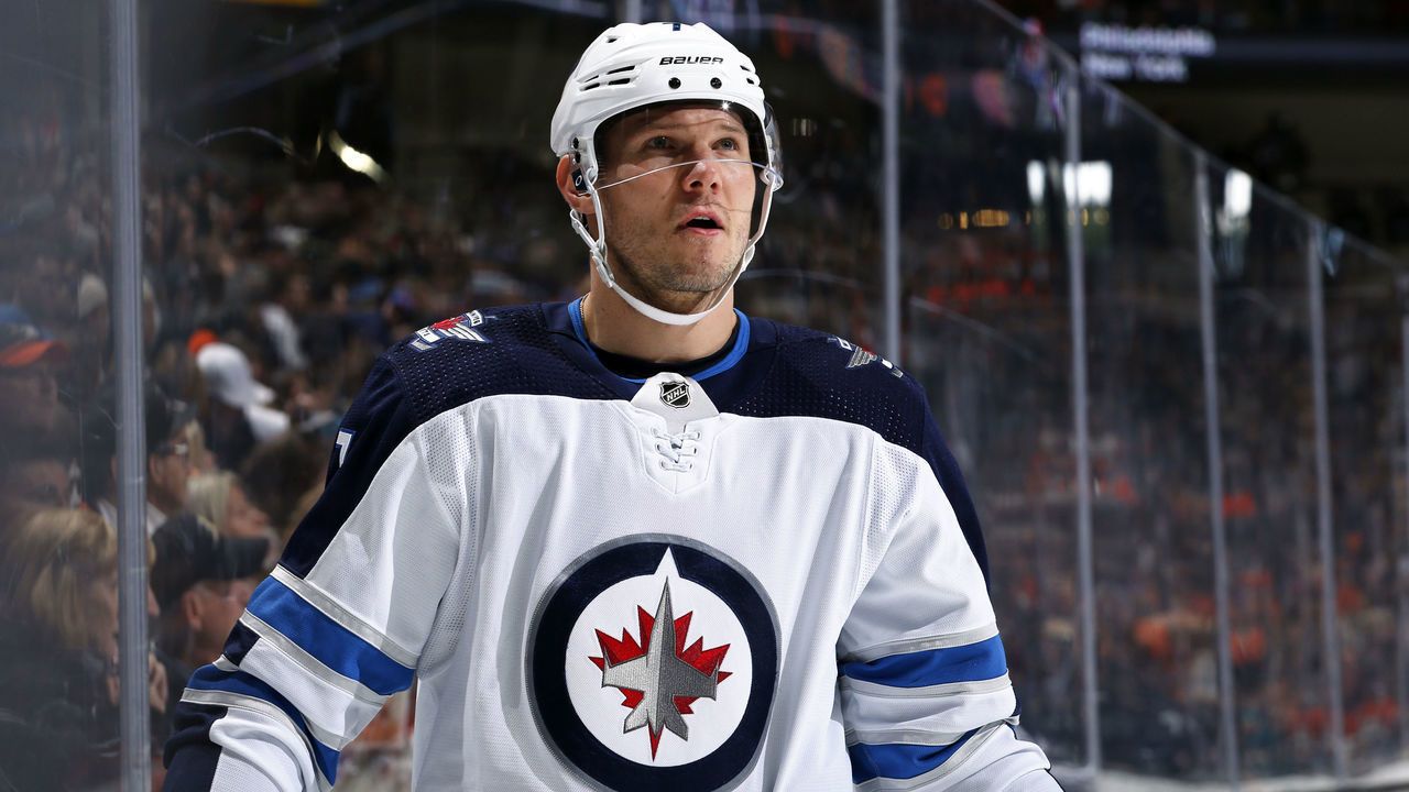 ANAHEIM, CA - NOVEMBER 29: Dmitry Kulikov #7 of the Winnipeg Jets skates during the game against the Anaheim Ducks at Honda Center on November 29, 2019 in Anaheim, California.