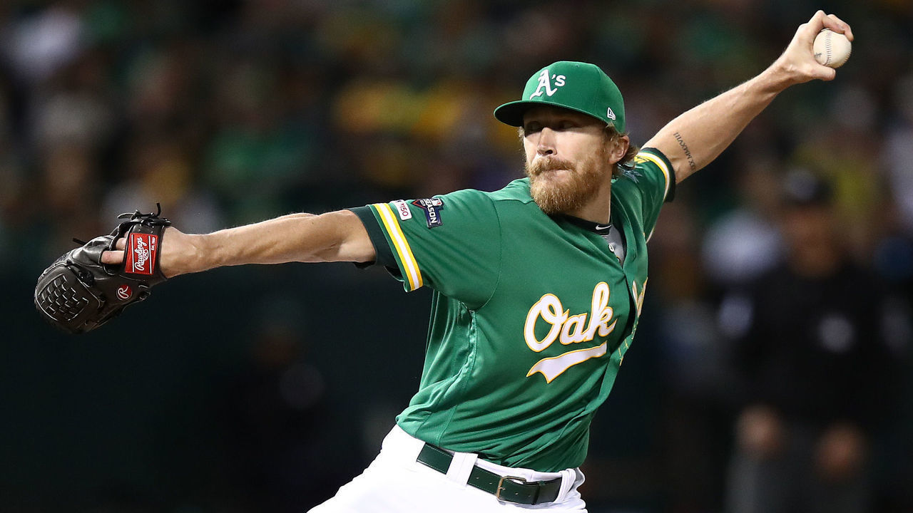 OAKLAND, CALIFORNIA - OCTOBER 02: Jake Diekman #35 of the Oakland Athletics pitches against the Tampa Bay Rays during the American League Wild Card Game at RingCentral Coliseum on October 02, 2019 in Oakland, California.
