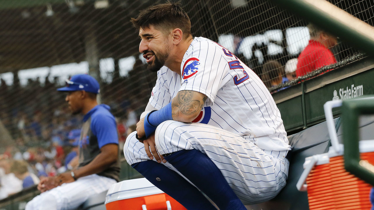 CHICAGO, ILLINOIS - SEPTEMBER 21: Nicholas Castellanos #6 of the Chicago Cubs lingers in the dugout for a couple extra minutes following his team's 9-8 loss to the St. Louis Cardinals at Wrigley Field on September 21, 2019 in Chicago, Illinois.