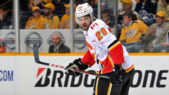 NASHVILLE, TN - APRIL 23: Akim Aliu #29 of the Calgary Flames skates against the Nashville Predators at the Bridgestone Arena on April 23, 2013 in Nashville, Tennessee.