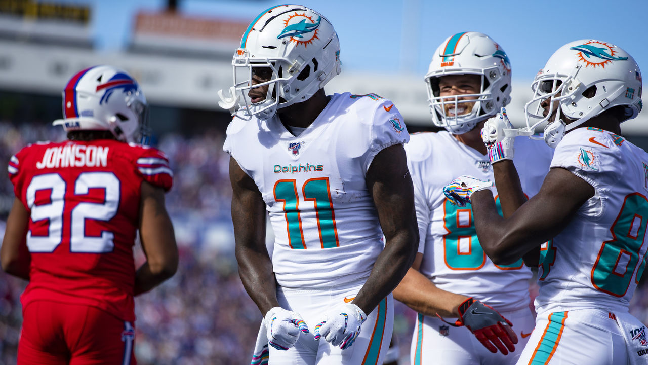 ORCHARD PARK, NY - OCTOBER 20: DeVante Parker #11 of the Miami Dolphins celebrates a touchdown reception during the second quarter against the Buffalo Bills at New Era Field on October 20, 2019 in Orchard Park, New York. Buffalo defeats Miami 31-21.