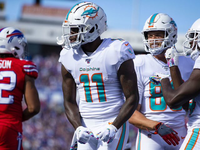 ORCHARD PARK, NY - OCTOBER 20: DeVante Parker #11 of the Miami Dolphins celebrates a touchdown reception during the second quarter against the Buffalo Bills at New Era Field on October 20, 2019 in Orchard Park, New York. Buffalo defeats Miami 31-21.